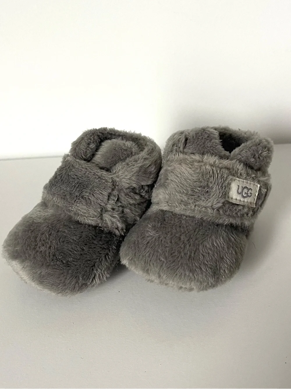 UGG “Bixbee” Plush Infant Slip-On Booties